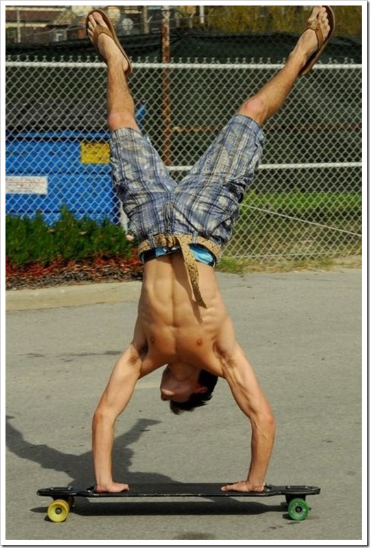 skateboarder-handstand