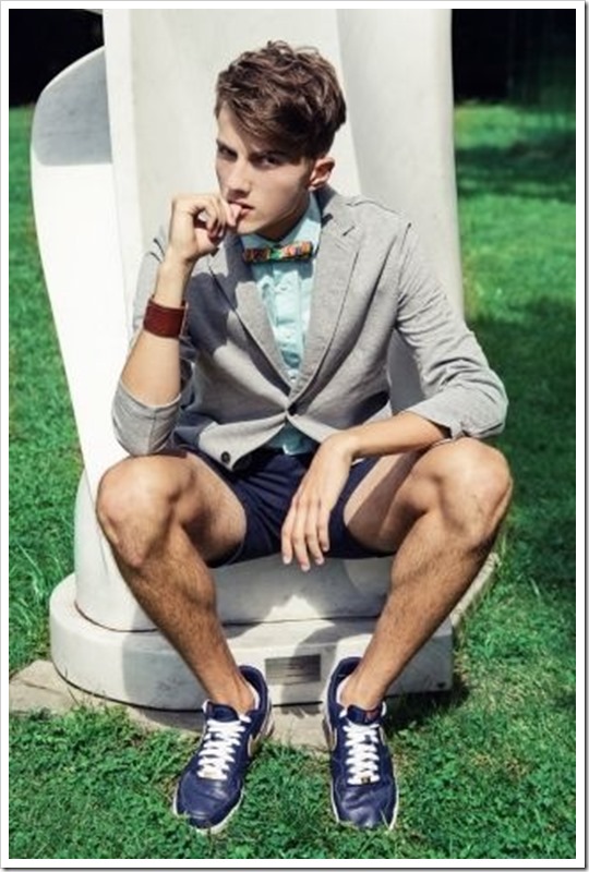 Hot preppy boy in bowtie and shorts