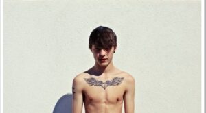 Shirtless, Tattooed Boy in Jeans