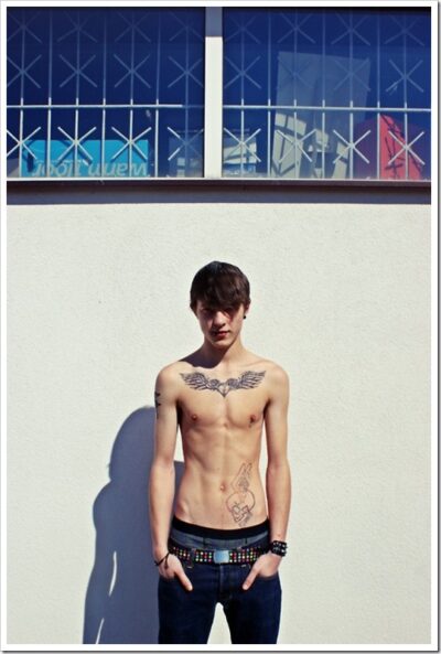 Shirtless, Tattooed Boy in Jeans
