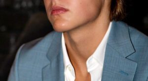 Featherd Hair and Plush Lips